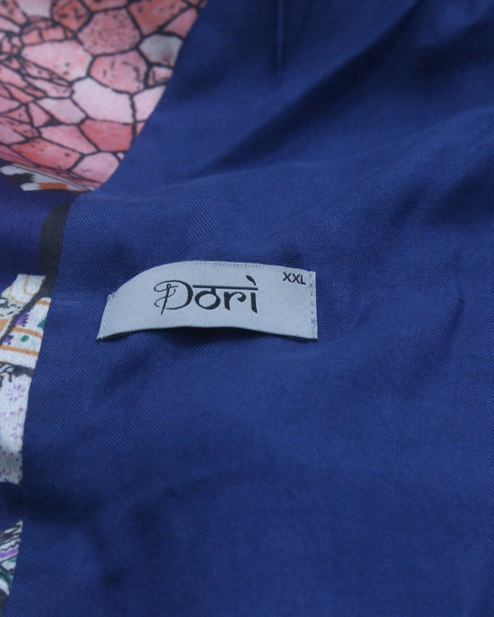 DORI woven label on the reverse of a hand-printed jacket